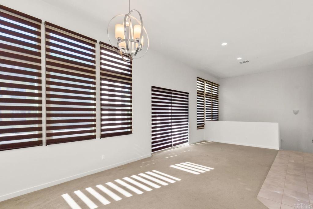 2012 Foxtrot Loop, Unit 3 Chula Vista, CA 91915 - Photo 11 of 34 a view of a room with windows and stairs