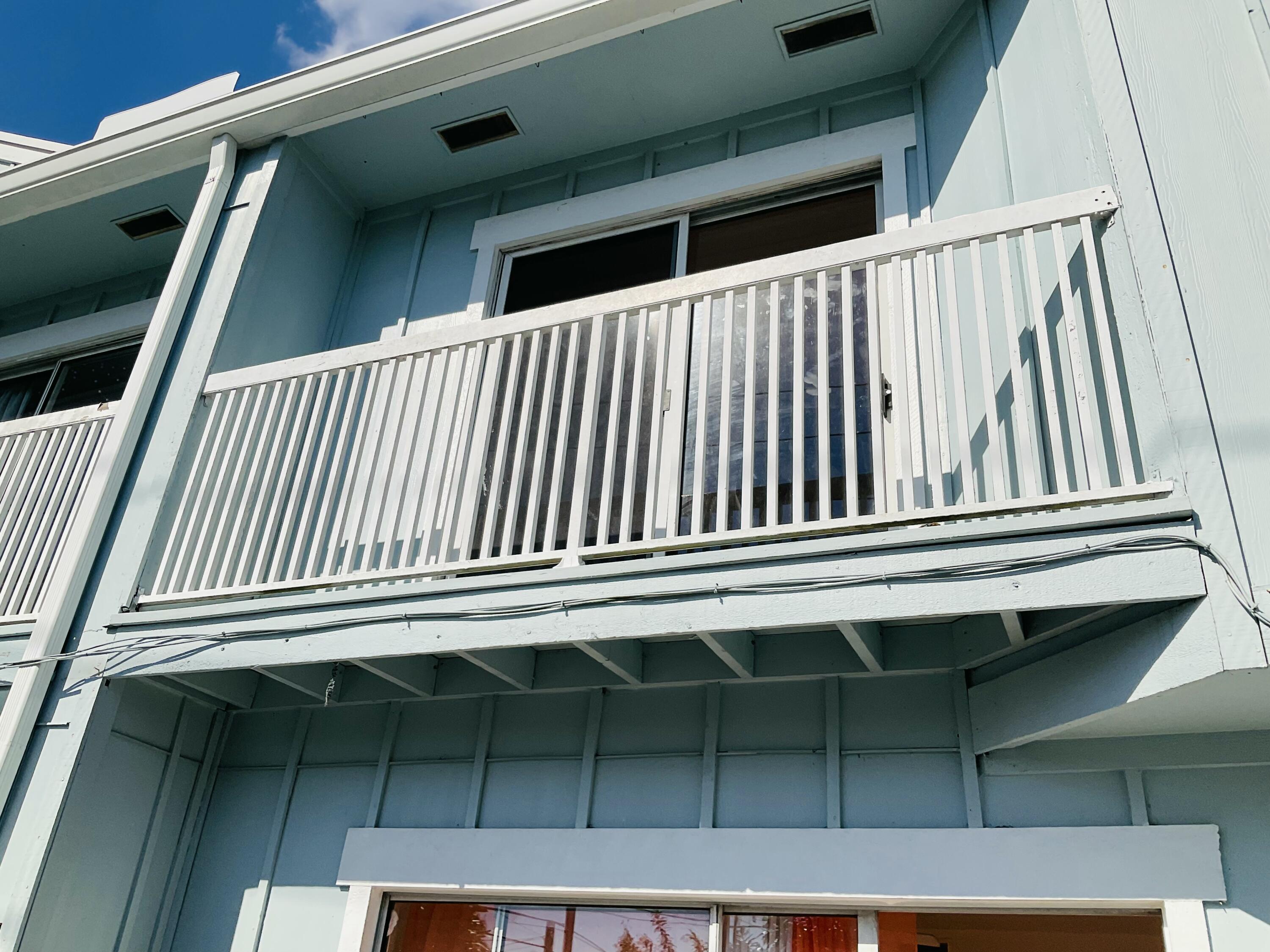 6262 Riverwalk Lane, Unit 3 Jupiter, FL 33458 - Photo 15 of 28 a view of outdoor space with deck and furniture