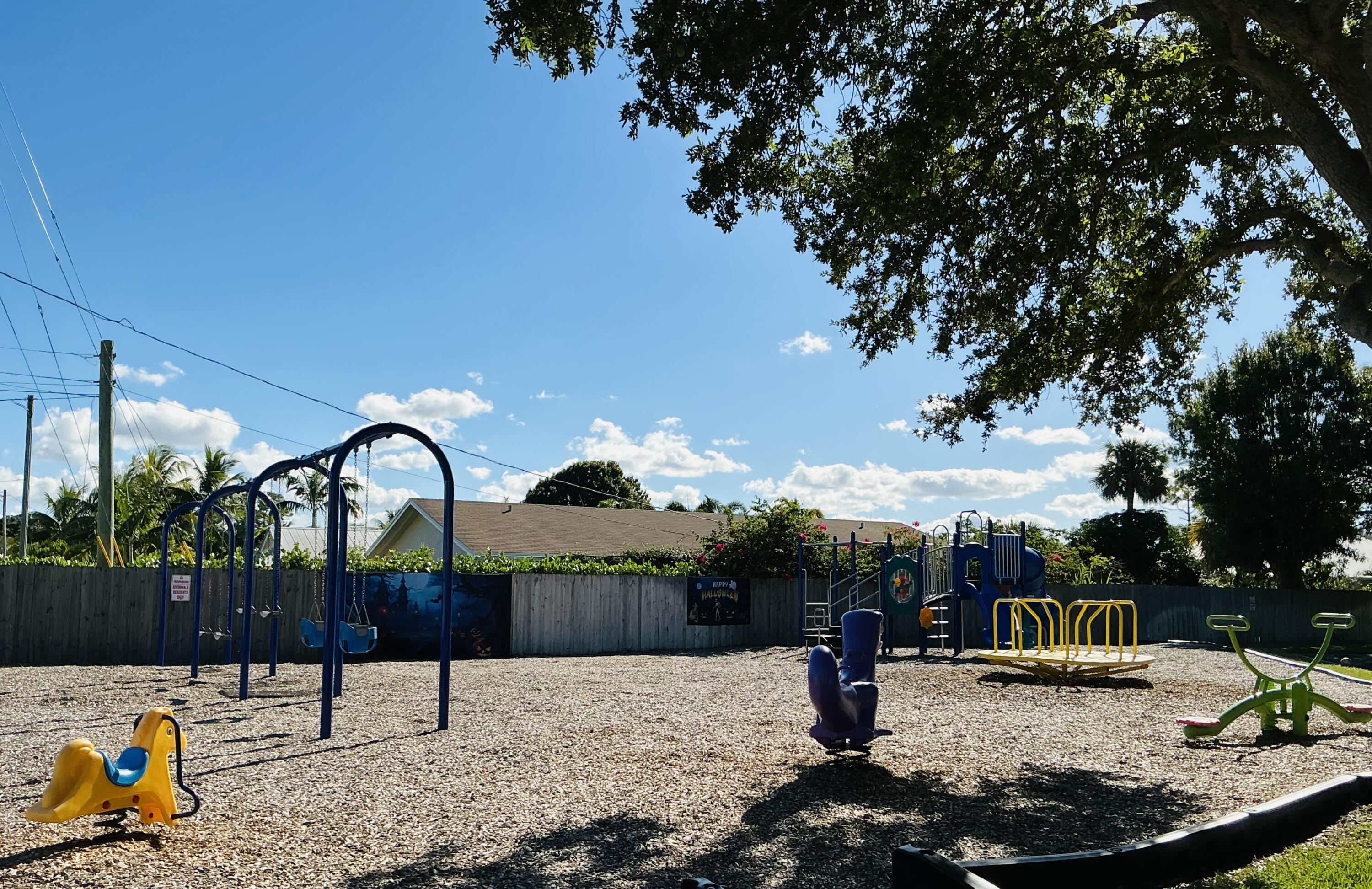 6262 Riverwalk Lane, Unit 3 Jupiter, FL 33458 - Photo 21 of 28 a view of outdoor space yard and patio