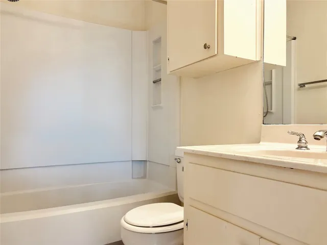 a view of a building with sitting area