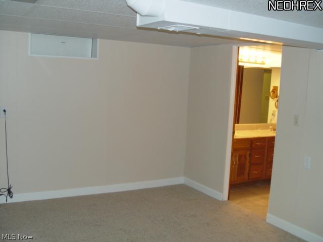 1081 Ledgeview Road Macedonia, OH 44056 - Photo 18 of 25 This is a 4th bedroom located in the basement and it has a closet and window.