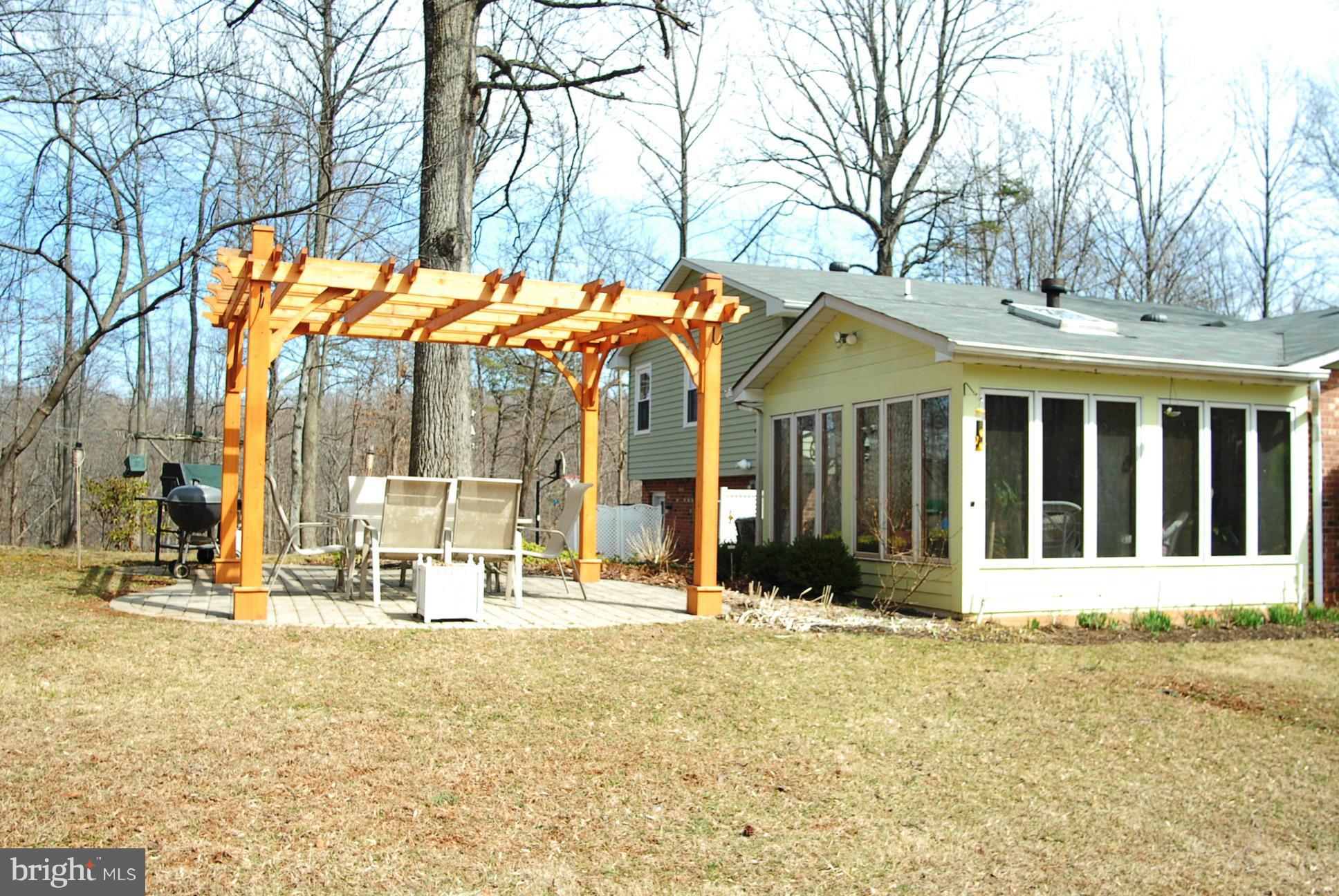 6208 Snow Mountain Road Broad Run, VA 20137 - Photo 3 of 29 sun room and trellis covered patio