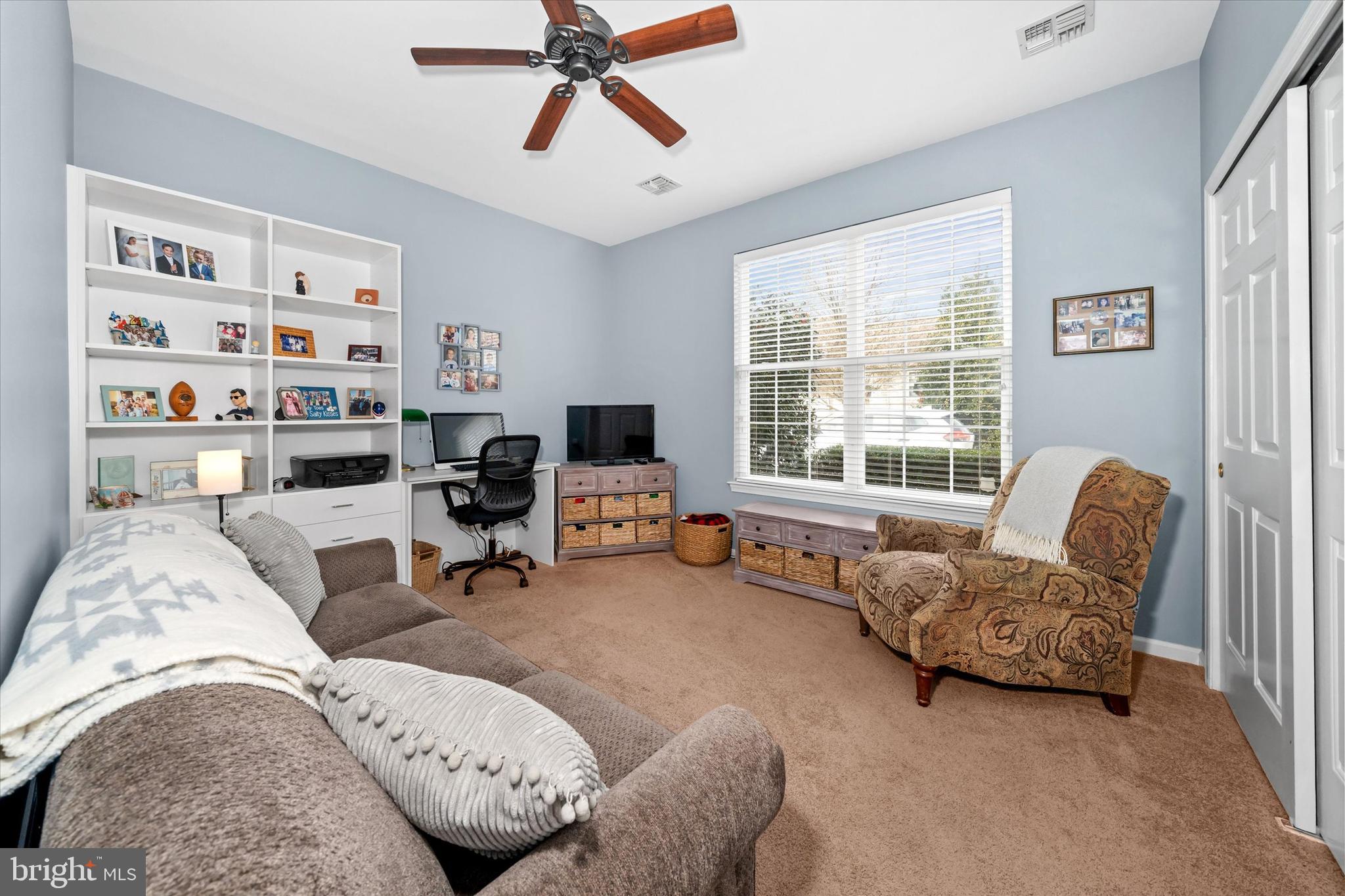 20 Hunters Way Glen Mills, PA 19342 - Photo 26 of 36 a living room with furniture and a window
