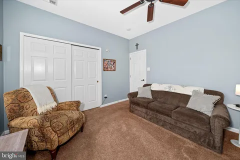 a living room with furniture and a couch