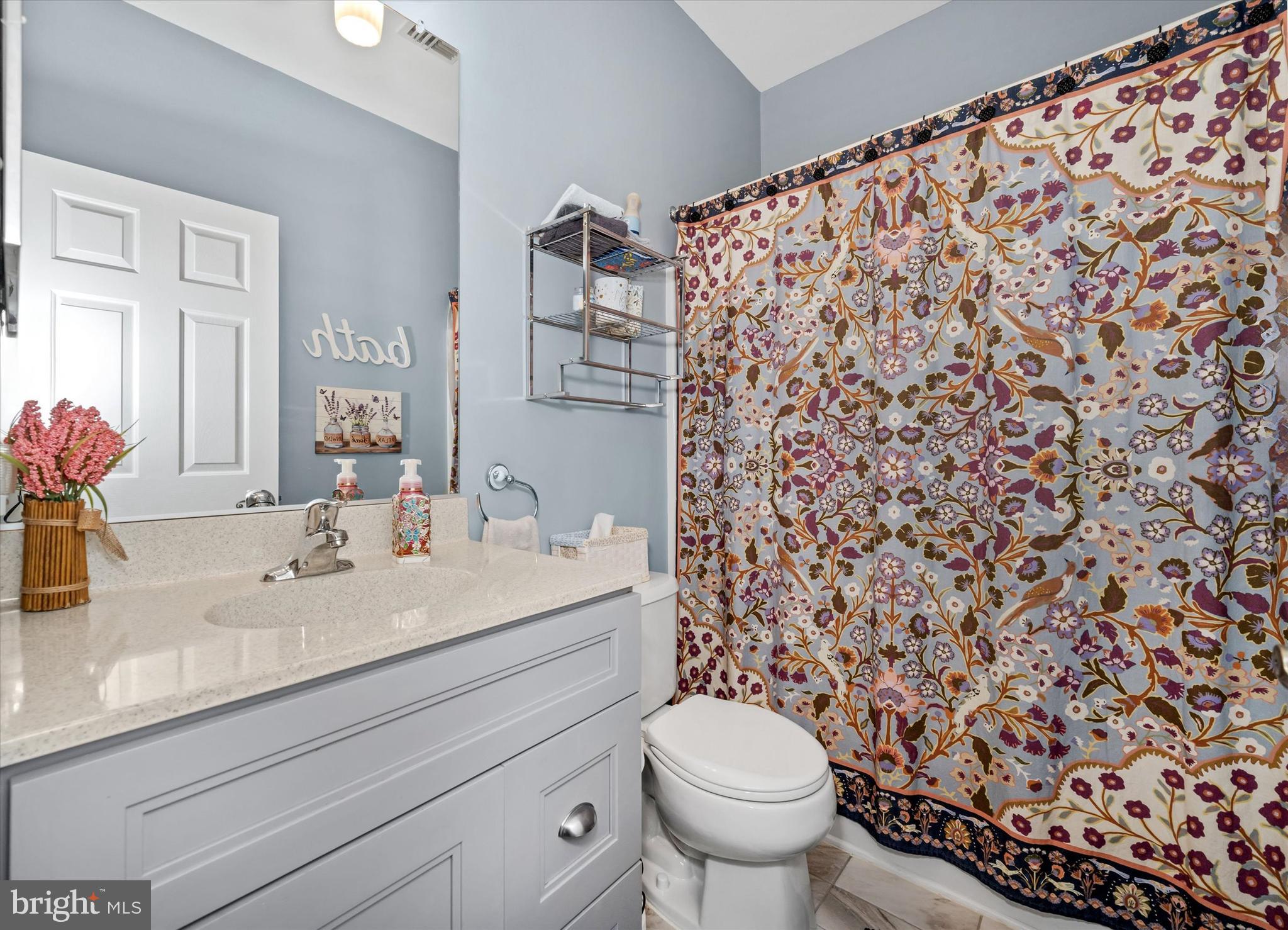 20 Hunters Way Glen Mills, PA 19342 - Photo 28 of 36 a bathroom with a granite countertop toilet and a sink