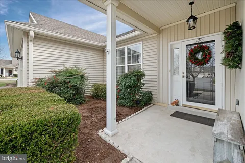 a view of a house with a porch