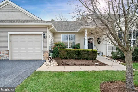 front view of a house with a small yard
