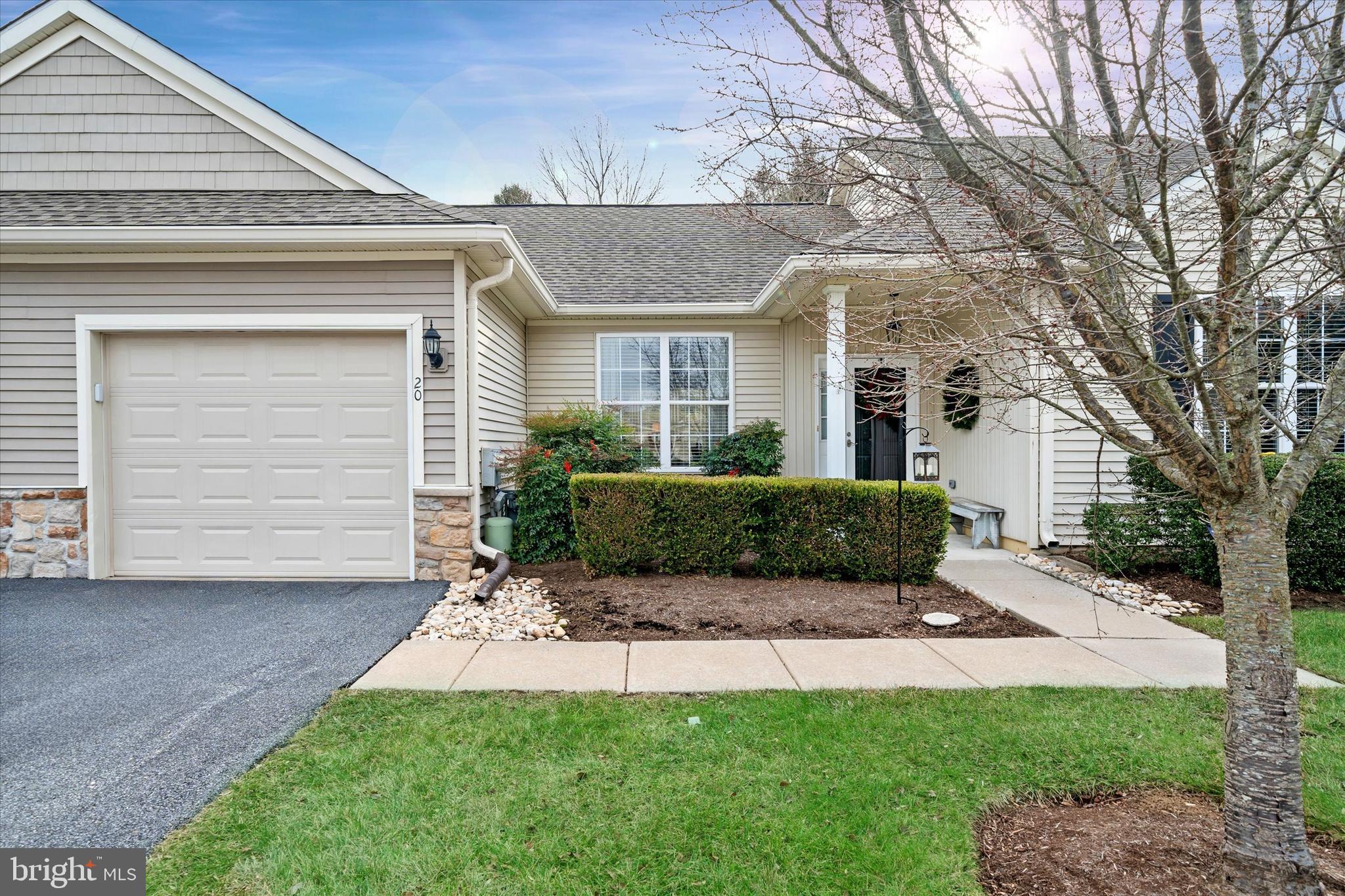 20 Hunters Way Glen Mills, PA 19342 - Photo 4 of 36 front view of a house with a small yard
