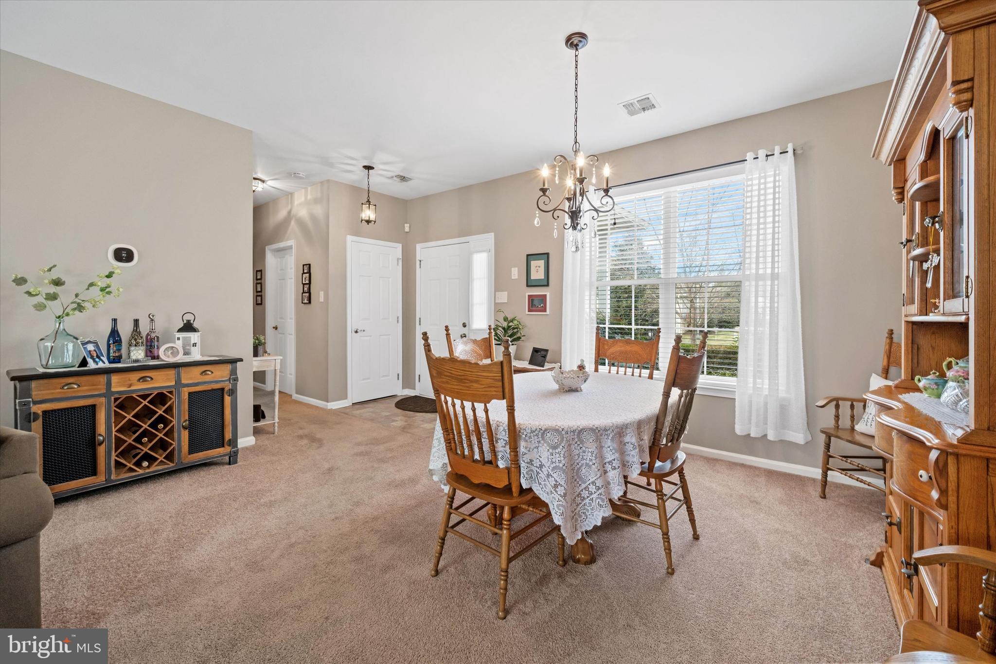20 Hunters Way Glen Mills, PA 19342 - Photo 5 of 36 a view of a dining room with furniture window and outside view