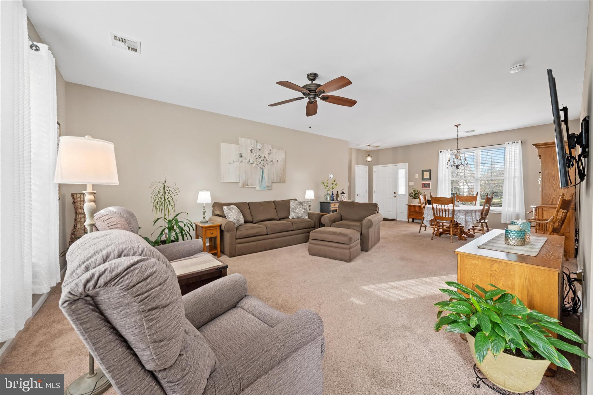 20 Hunters Way Glen Mills, PA 19342 - Photo 6 of 36 a living room with furniture potted plant and a window