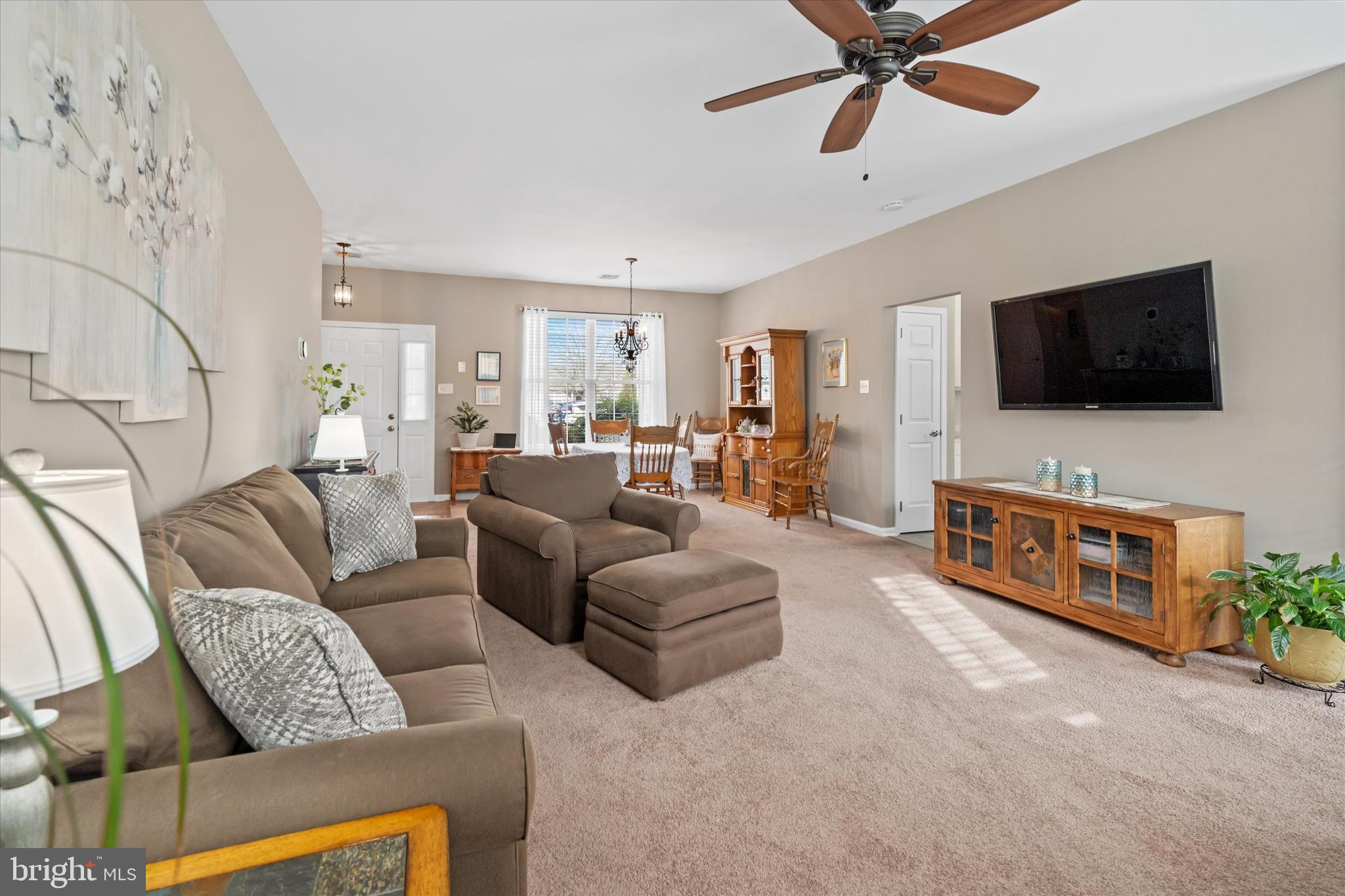 20 Hunters Way Glen Mills, PA 19342 - Photo 9 of 36 a living room with furniture and a flat screen tv