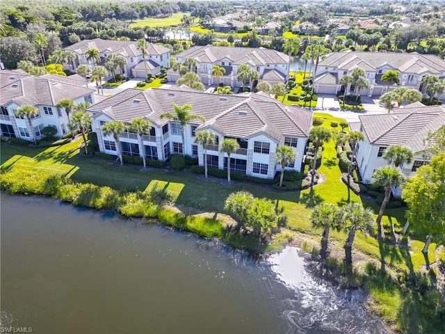 a view of a swimming pool with lounge chair