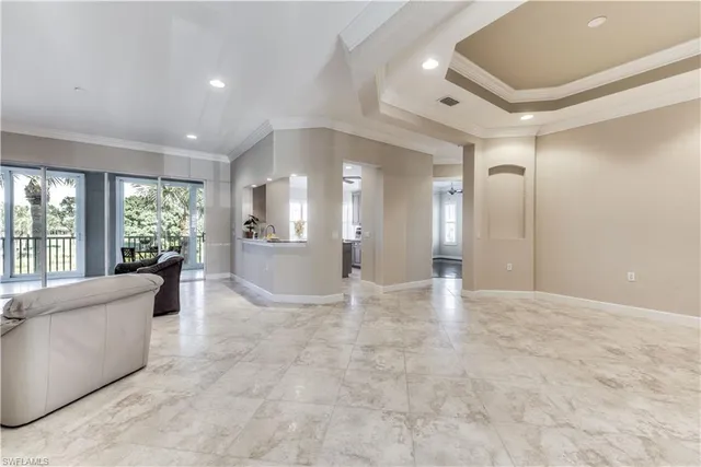 a view of a big room with large windows