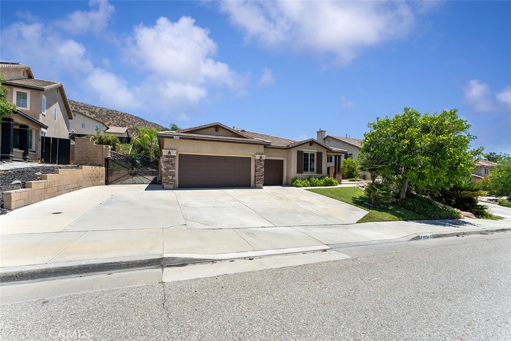 29184 Stone Ridge Street Menifee, CA 92584 - Photo 1 of 1 a view of house with yard street and trees