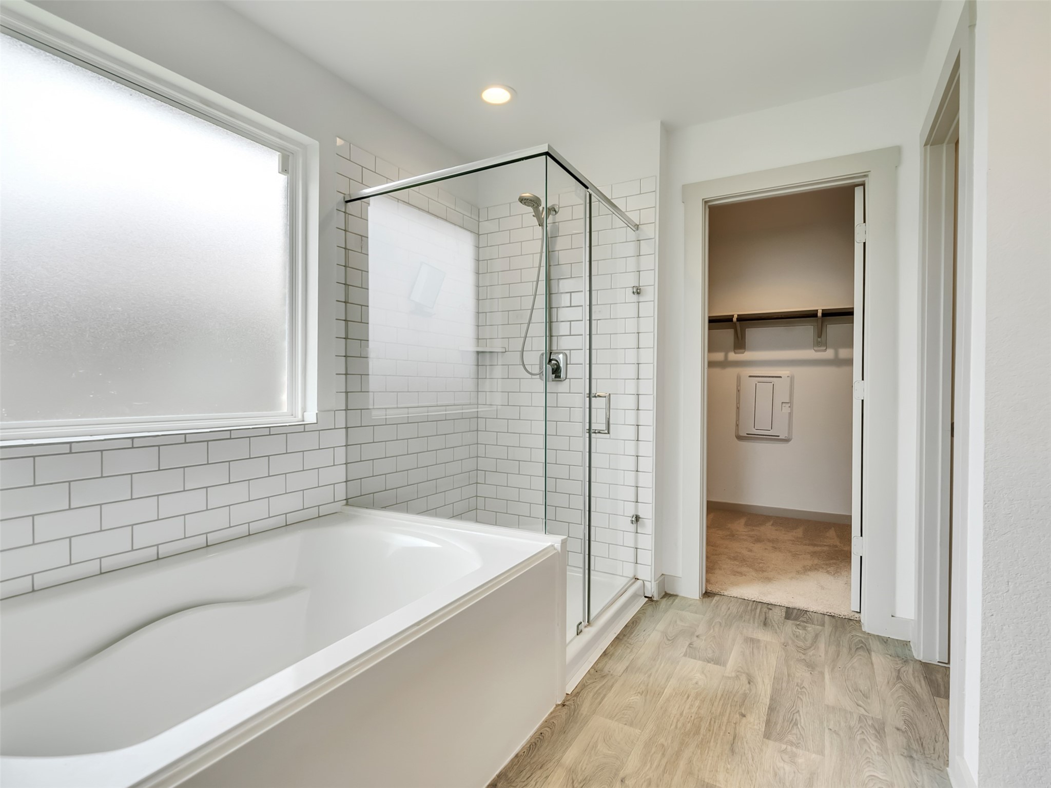 8003 Alcott Forest Lane Rosharon, TX 77583 - Photo 30 of 41 a bathroom with a bathtub and a shower