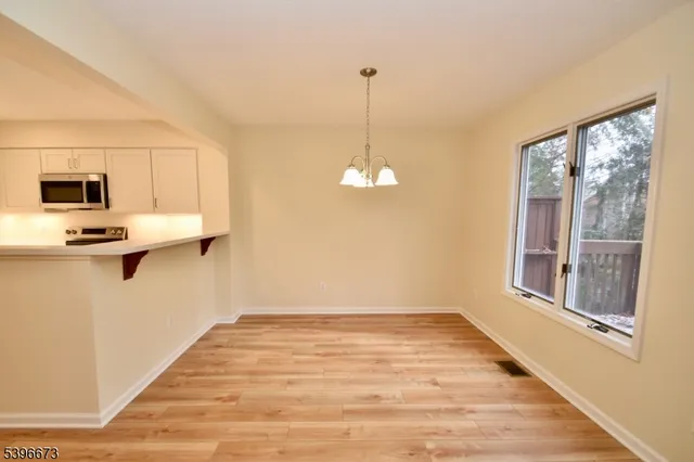 a view of a kitchen from the windows