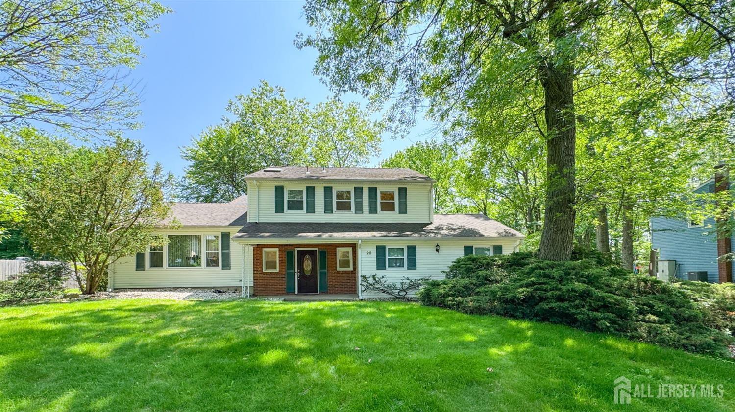 25 Sherwood Road Edison, NJ 08820 - Photo 1 of 25 a front view of a house with a yard