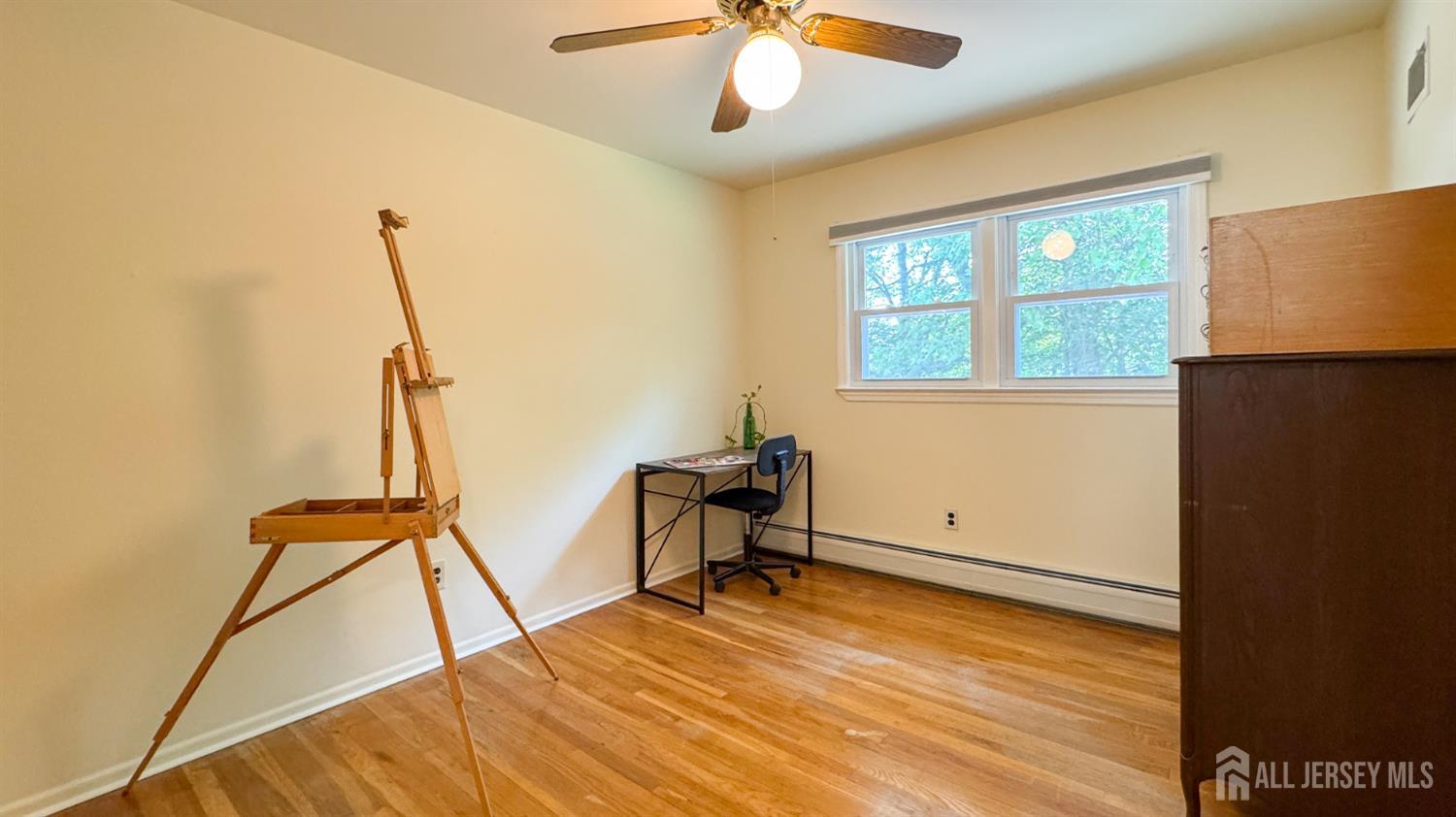 25 Sherwood Road Edison, NJ 08820 - Photo 19 of 25 a room with furniture and window