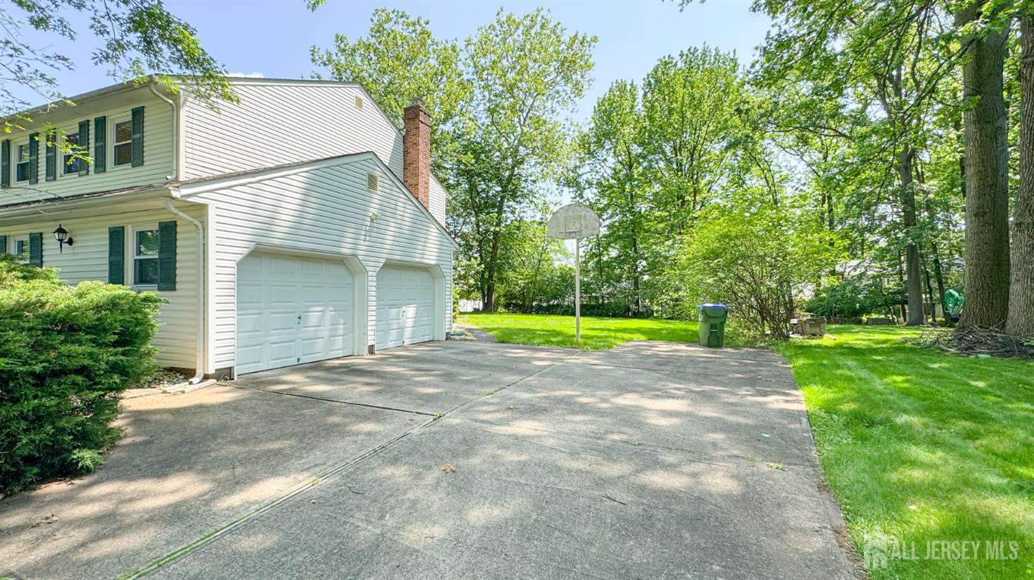 25 Sherwood Road Edison, NJ 08820 - Photo 2 of 25 a view of backyard with swimming pool