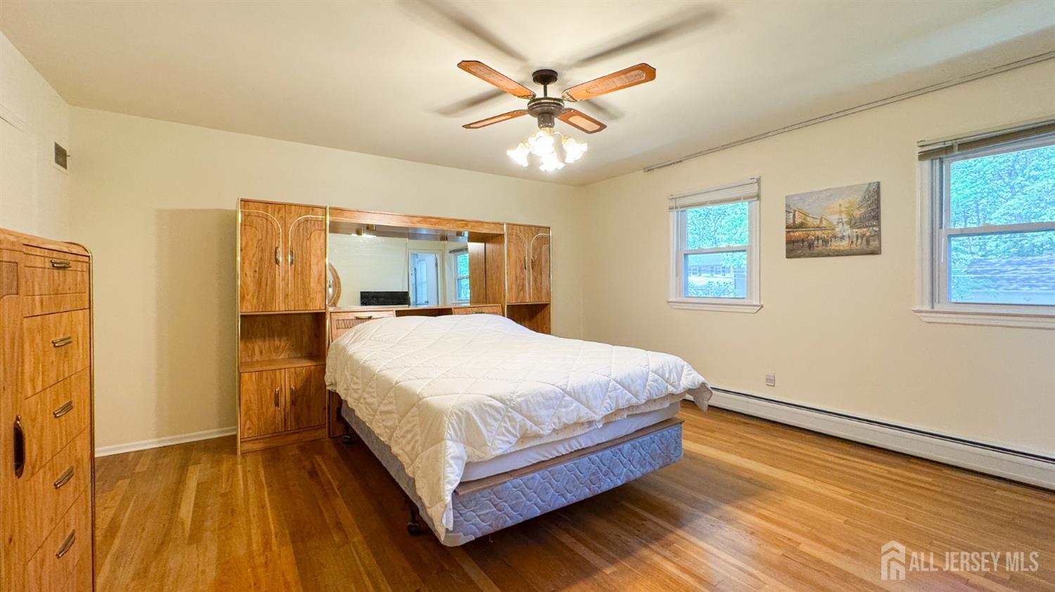 25 Sherwood Road Edison, NJ 08820 - Photo 22 of 25 a bedroom with a bed and window