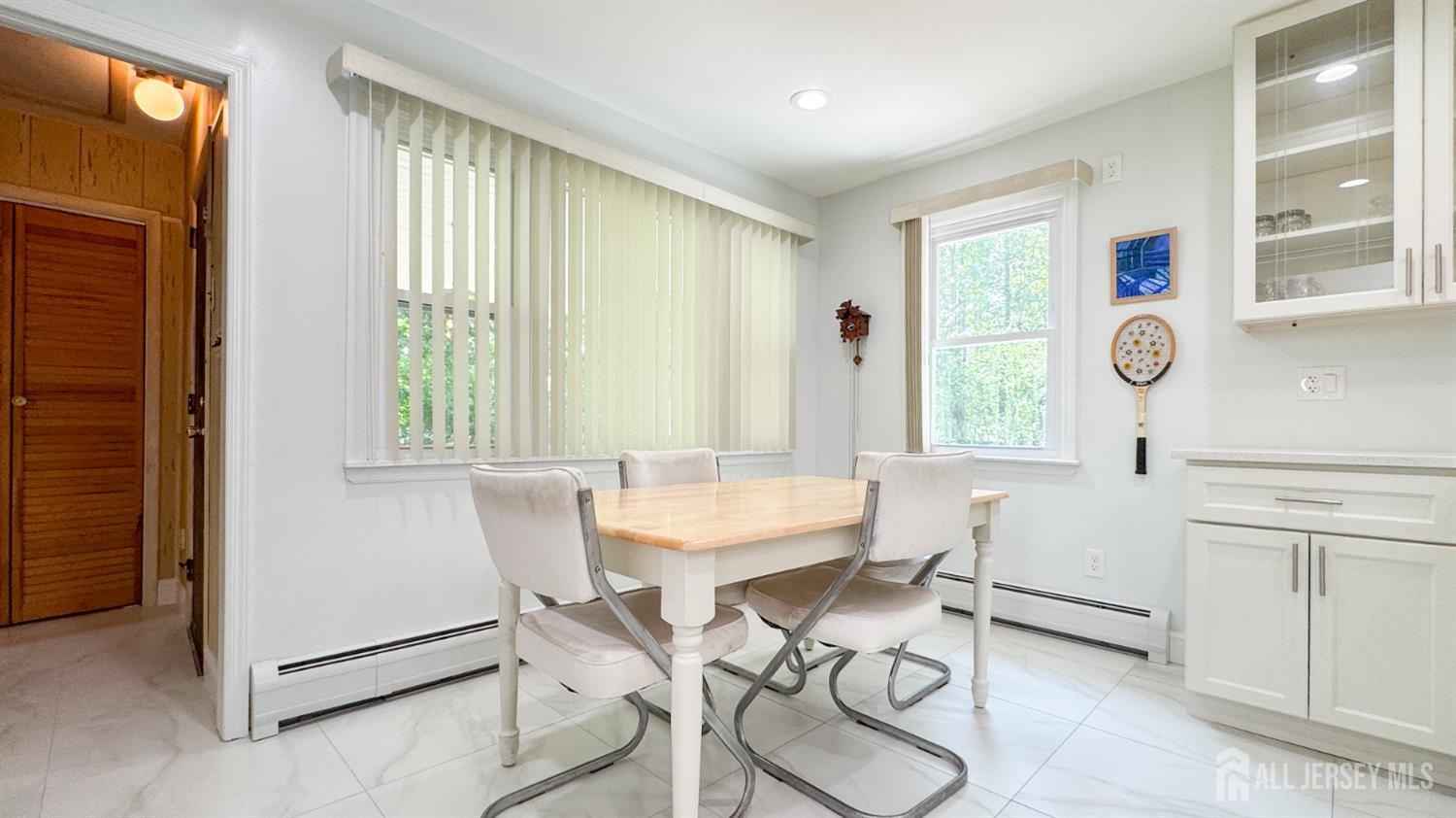 25 Sherwood Road Edison, NJ 08820 - Photo 6 of 25 a view of a dining room with furniture and window