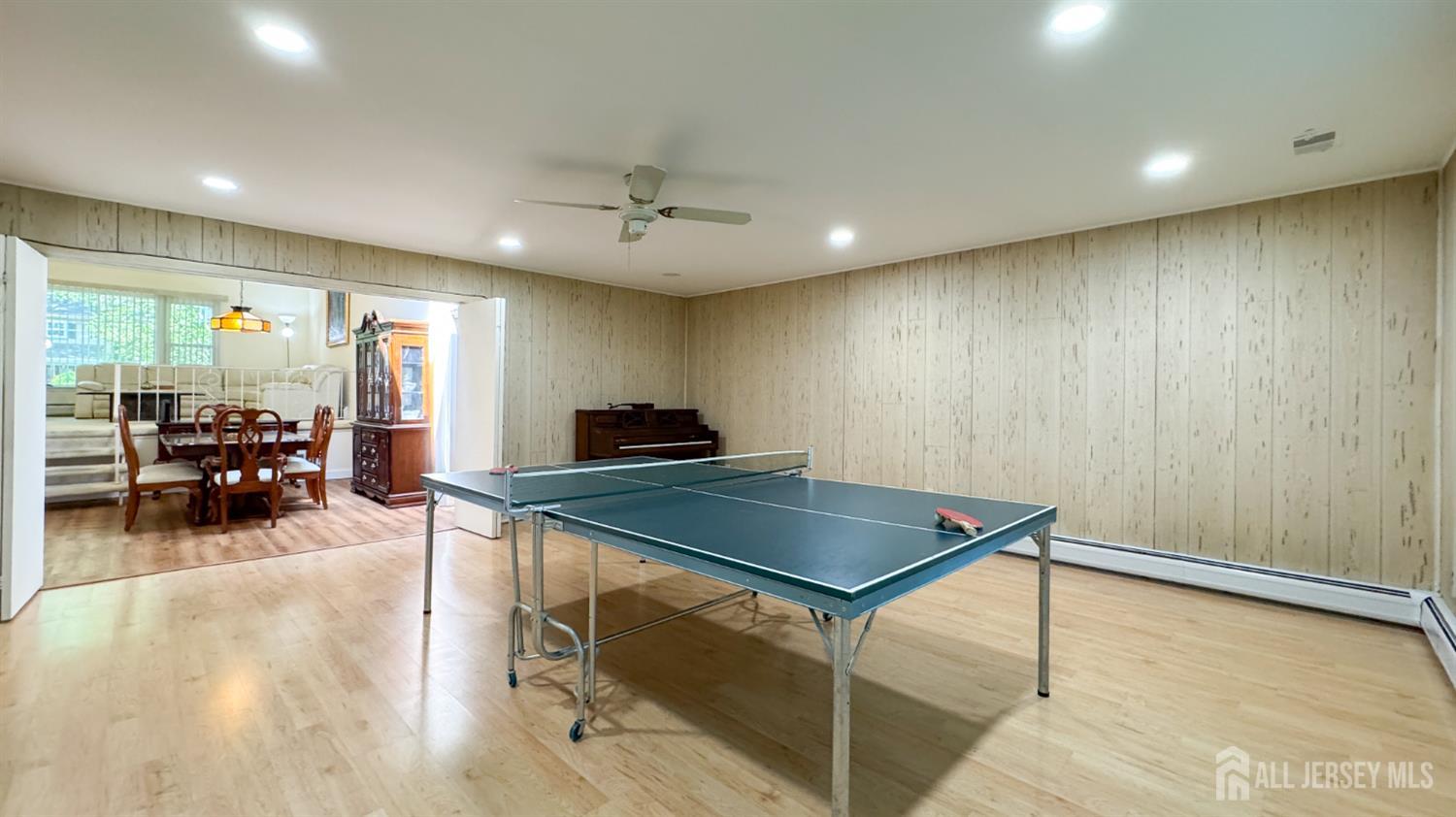 25 Sherwood Road Edison, NJ 08820 - Photo 10 of 25 a view of a room with furniture and wooden floor