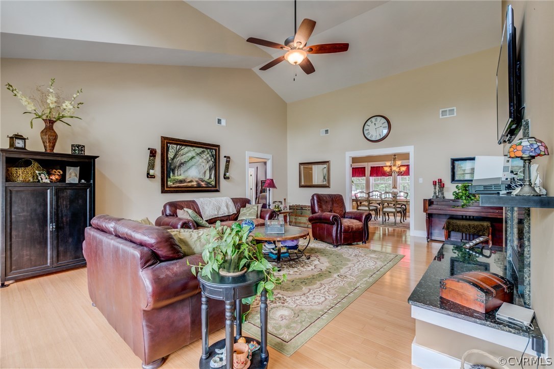 3401 Mill Quarter Road Ford, VA 23850 - Photo 16 of 34 a living room with furniture and a flat screen tv