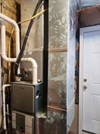 280 Ridge Street Fall River, MA 02721 - Photo 12 of 13 a close view of water heater room