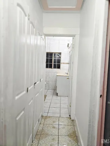 a bathroom with a sink and mirror