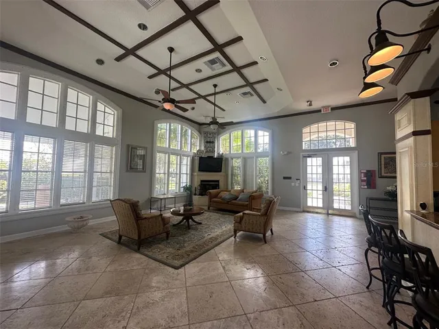 a lobby with furniture and windows