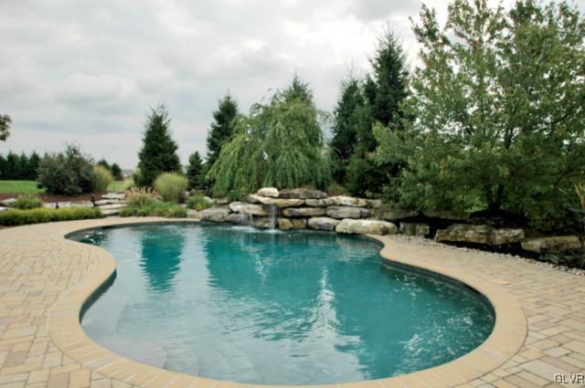 410 Colver Road Nazareth, PA 18064 - Photo 12 of 13 a view of a swimming pool with a yard