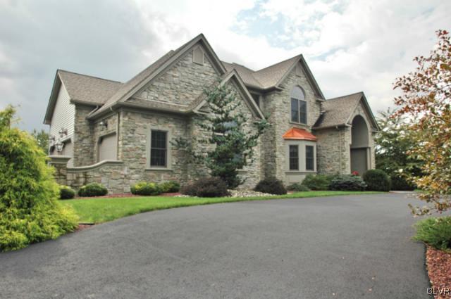 410 Colver Road Nazareth, PA 18064 - Photo 2 of 13 a front view of house with yard and green space