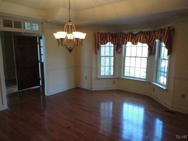 410 Colver Road Nazareth, PA 18064 - Photo 3 of 13 a view of a room with wooden floor and windows