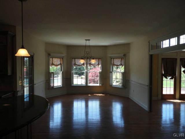 410 Colver Road Nazareth, PA 18064 - Photo 4 of 13 a view of a room with wooden floor and windows
