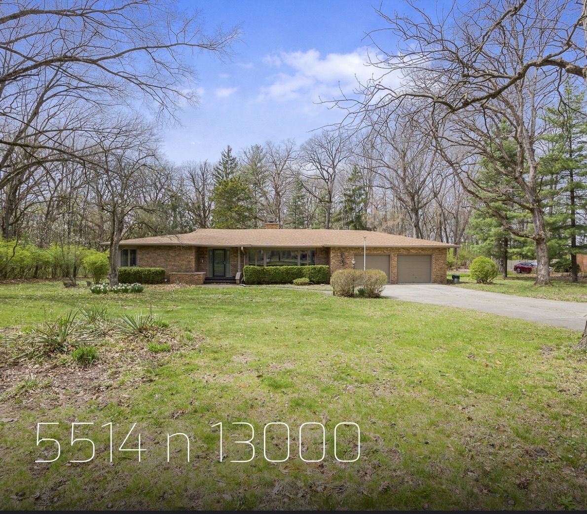 5514 North 13000th Road East Momence, IL 60954 - Photo 1 of 27 a front view of a house with a garden