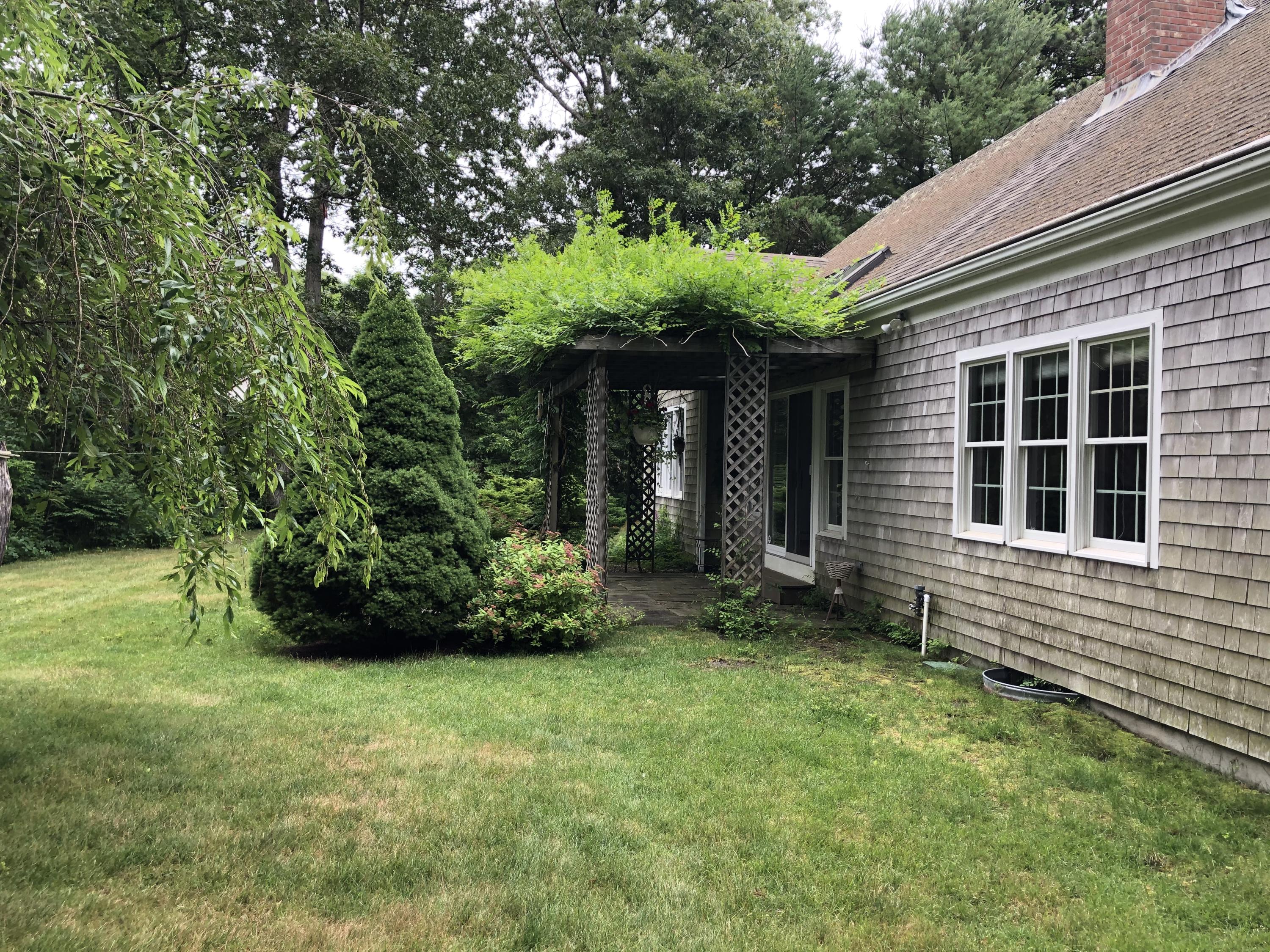 33 Thomegan Road Brewster, MA 02631 - Photo 7 of 40 Back Yard Side