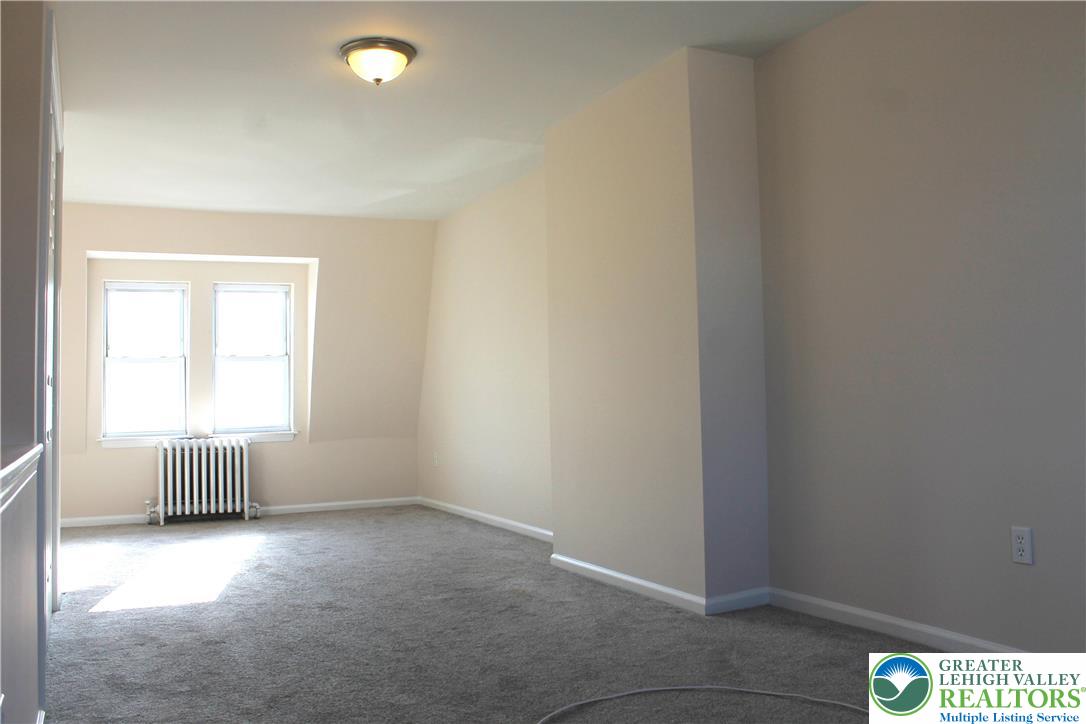 815 Greenleaf Street Allentown, PA 18102 - Photo 12 of 13 an empty room with windows