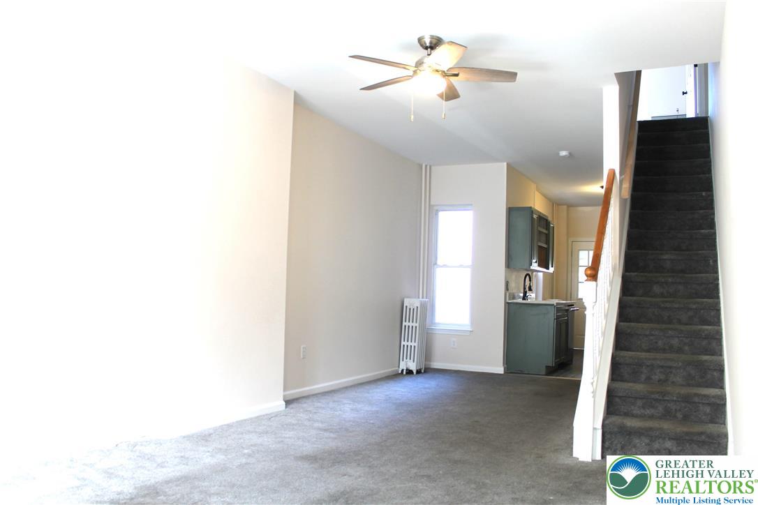 815 Greenleaf Street Allentown, PA 18102 - Photo 2 of 13 a view of a hallway with a bathroom
