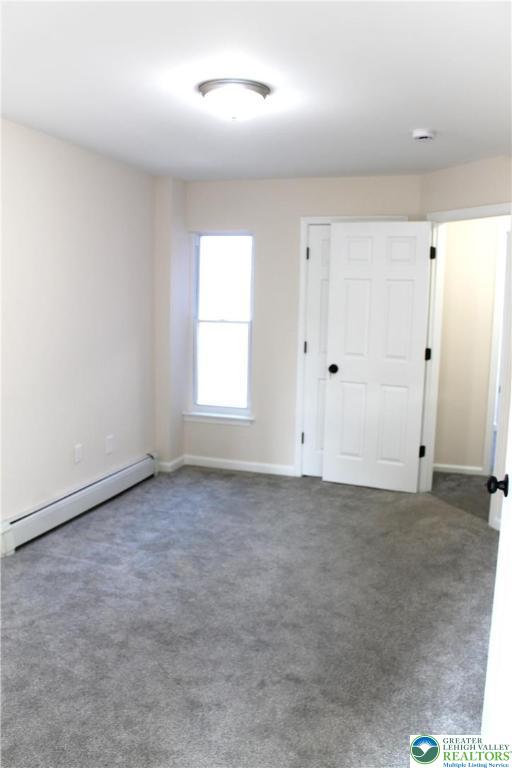 815 Greenleaf Street Allentown, PA 18102 - Photo 10 of 13 an empty room with windows