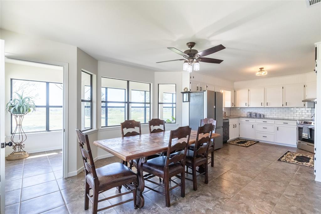 642 Fm 3200 Comanche, TX 76442 - Photo 5 of 37 a view of a dining room with furniture and a chandelier