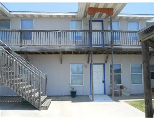 a balcony view with a sitting space