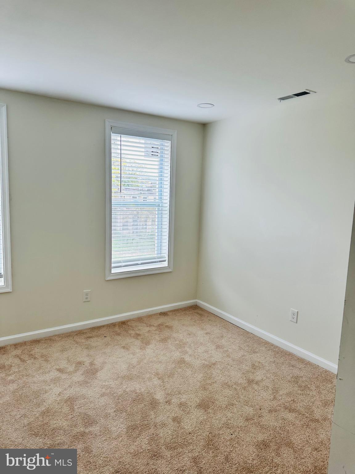 1921 Herbert Street Baltimore, MD 21217 - Photo 8 of 12 an empty room with a window