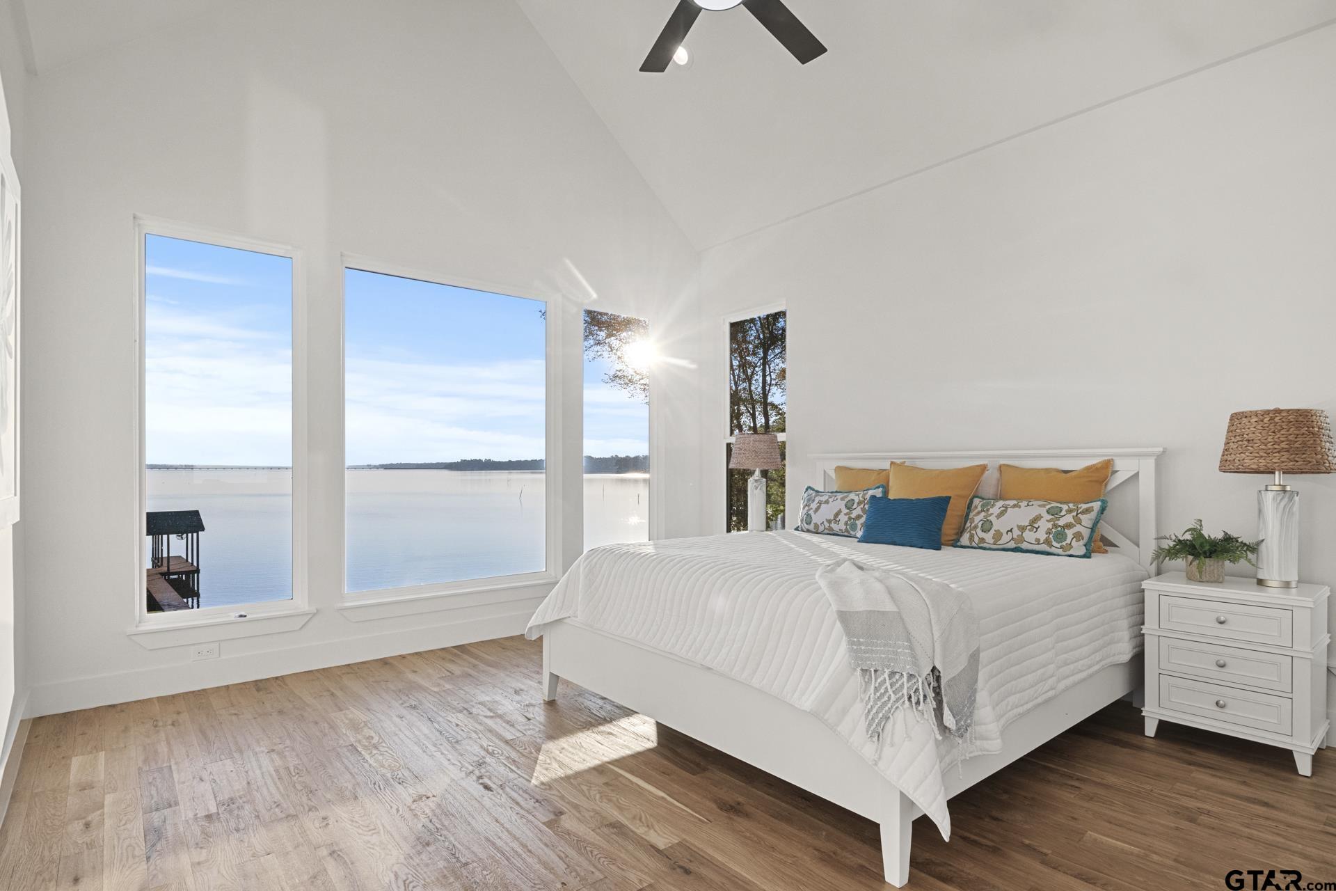 641 North Private Road Leesburg, TX 75451 - Photo 11 of 44 a bedroom with a bed and large window