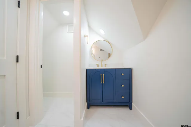 a view of a hallway with front door