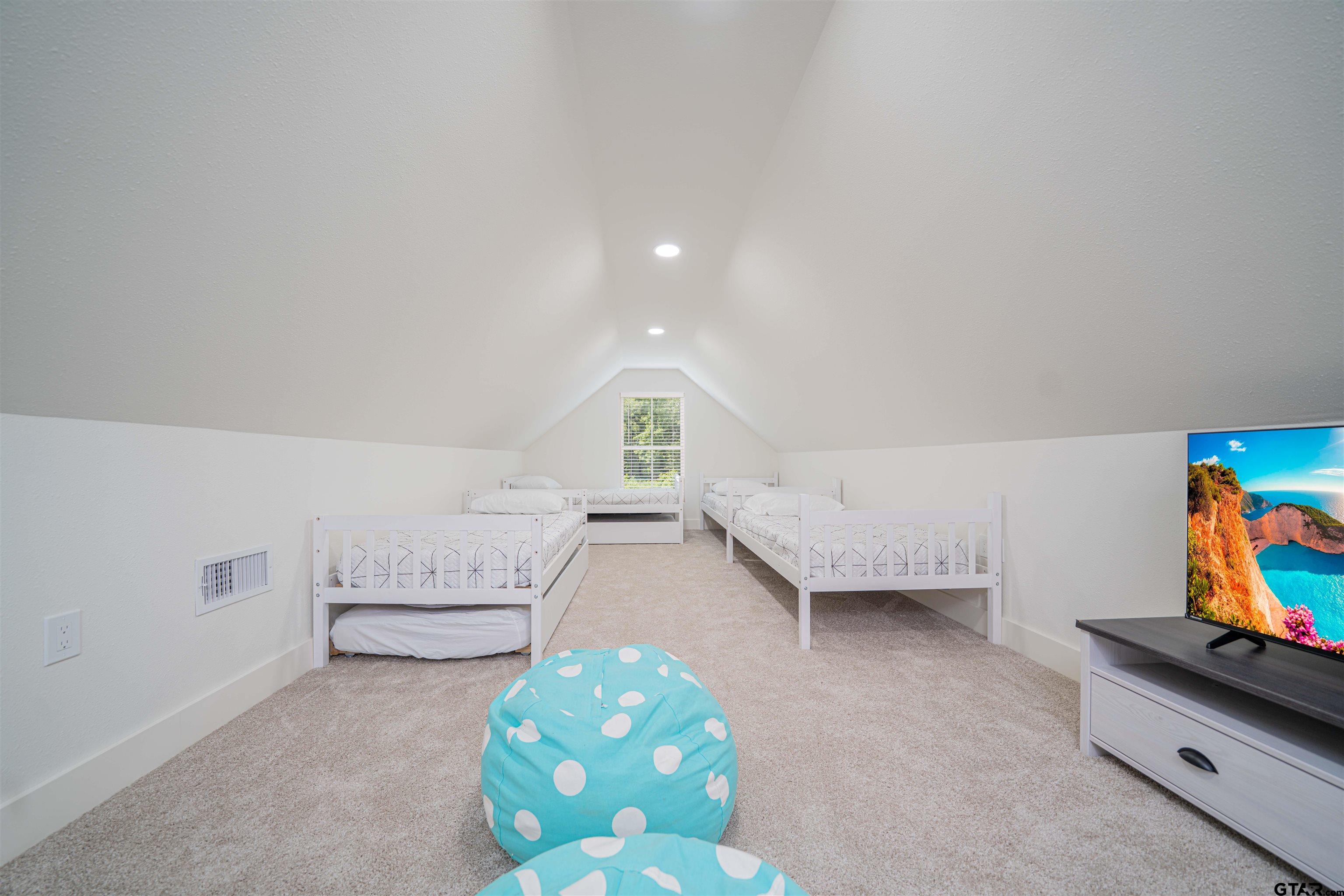 641 North Private Road Leesburg, TX 75451 - Photo 27 of 44 a bedroom with furniture and a wooden floor