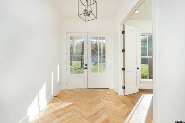 a view of a room with a cabinets and a window