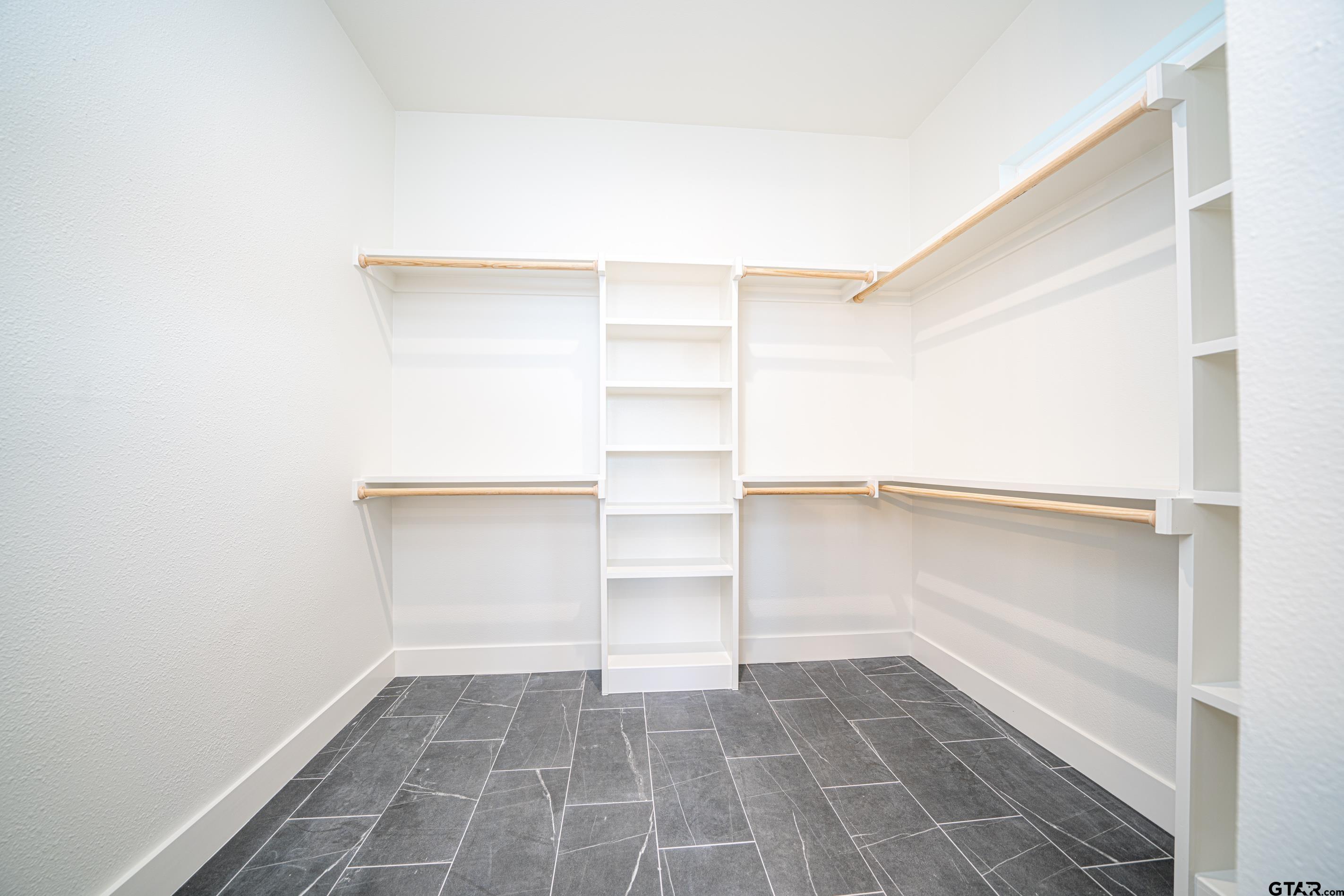 641 North Private Road Leesburg, TX 75451 - Photo 33 of 44 a view of a room with a cabinets and a window