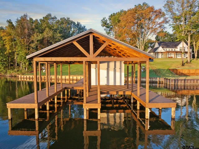 a view of a hallway with a backyard space