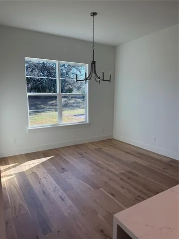 a stove top oven sitting inside of a kitchen