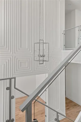 a view of an empty room with a fireplace